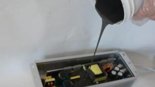 High thermal conductivity silicone potting compound for automotive electronic control units